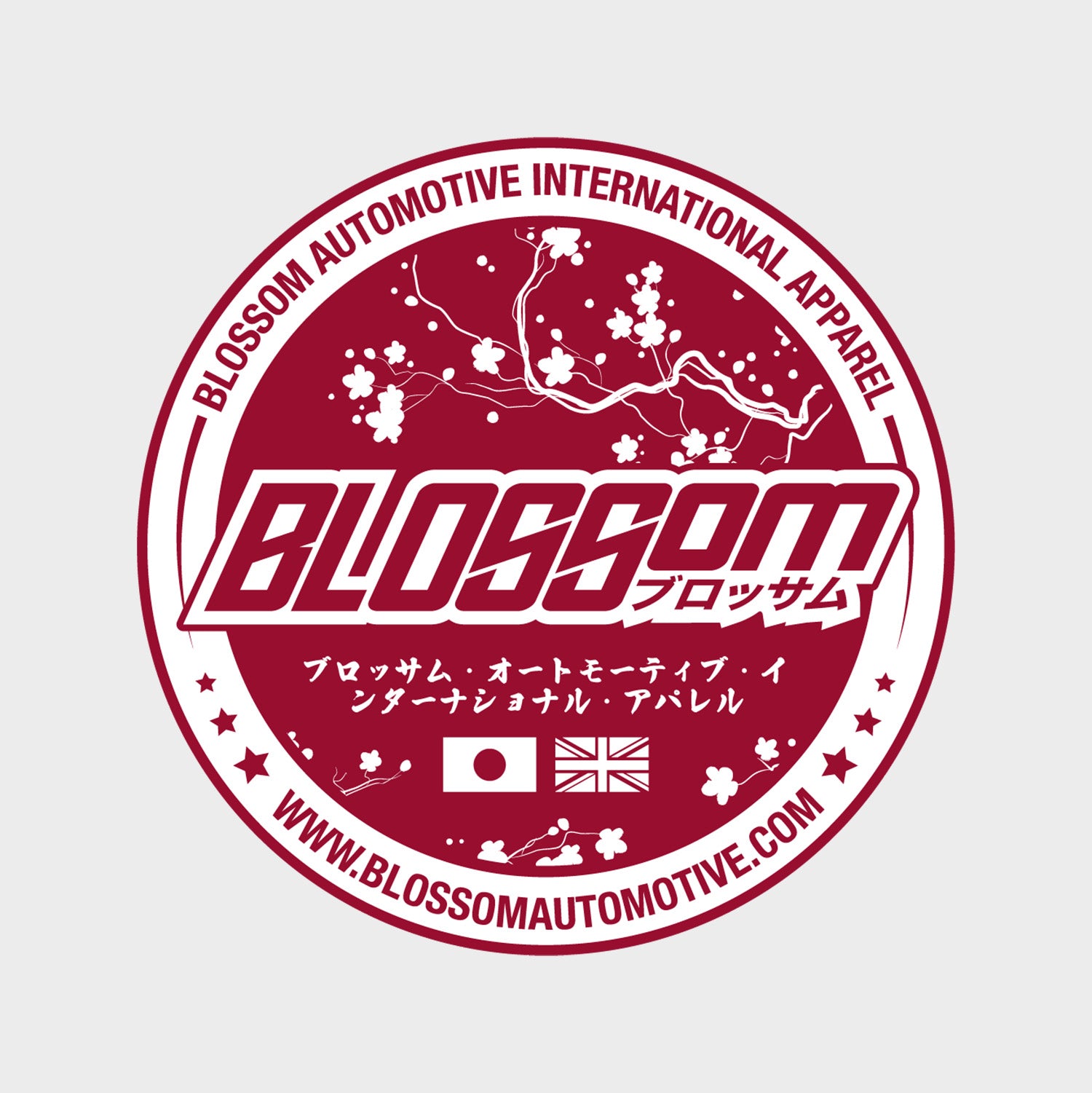 Circular maroon logo sticker featuring cherry blossoms, Japanese and English text, and two small flags (Japan, USA) at the bottom. Text: Blossom Automotive Classic Disc Slap Sticker and www.blossomautomotive.com.