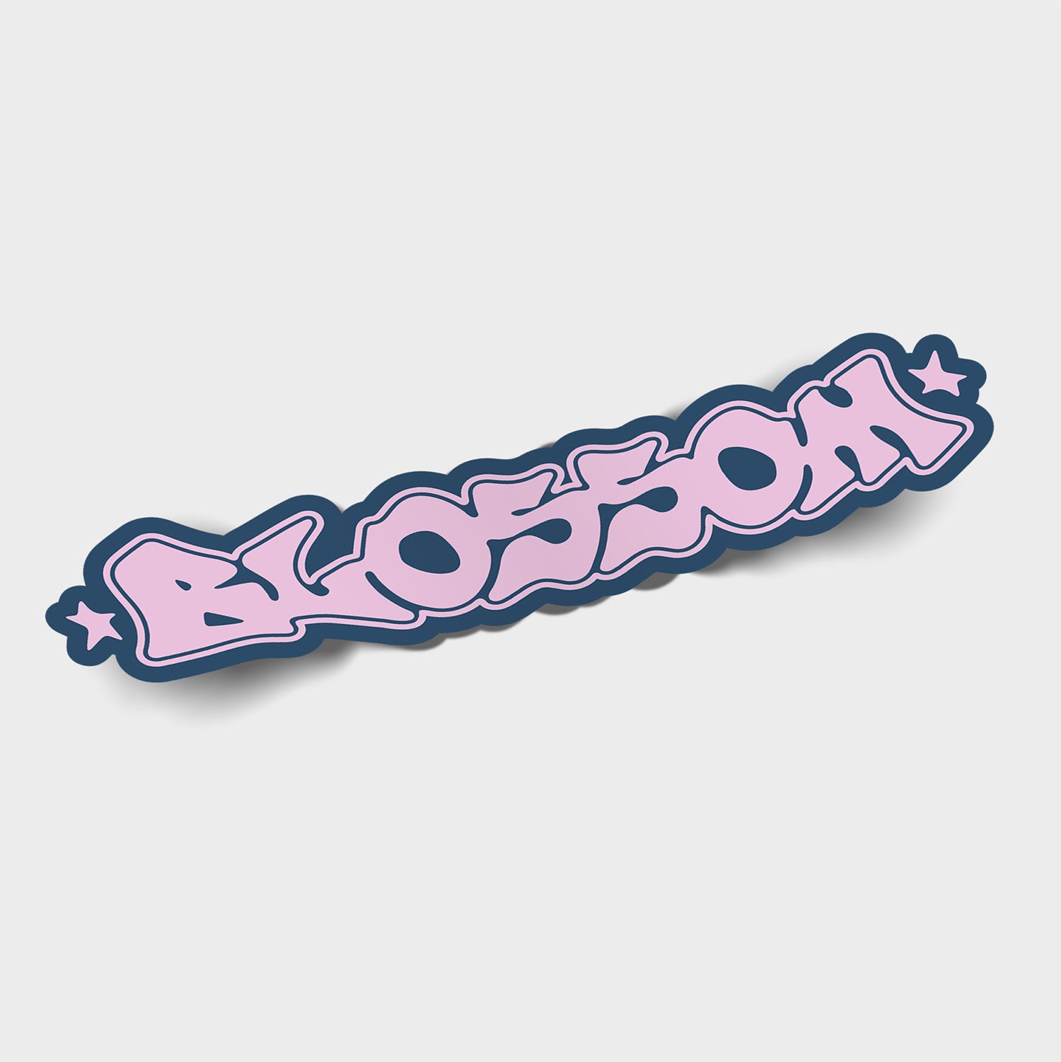 The Pink and Navy Blue Blossom - Slap Sticker by Blossom Automotive features graffiti-style BLOSSOM text in bold pink with a navy outline, small stars at each end, on a light gray background.