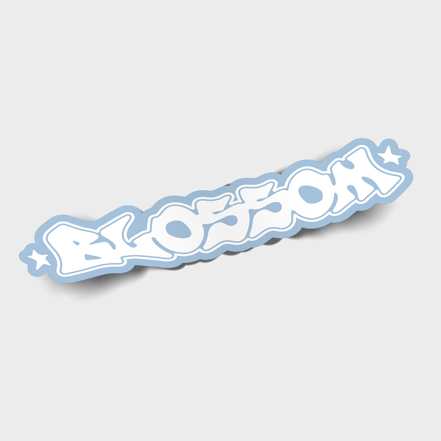 The White and Light Blue Blossom - Slap Sticker by Blossom Automotive features “BLOSSOM” in bold, graffiti-style letters with a blue outline and star accents on a light gray background.