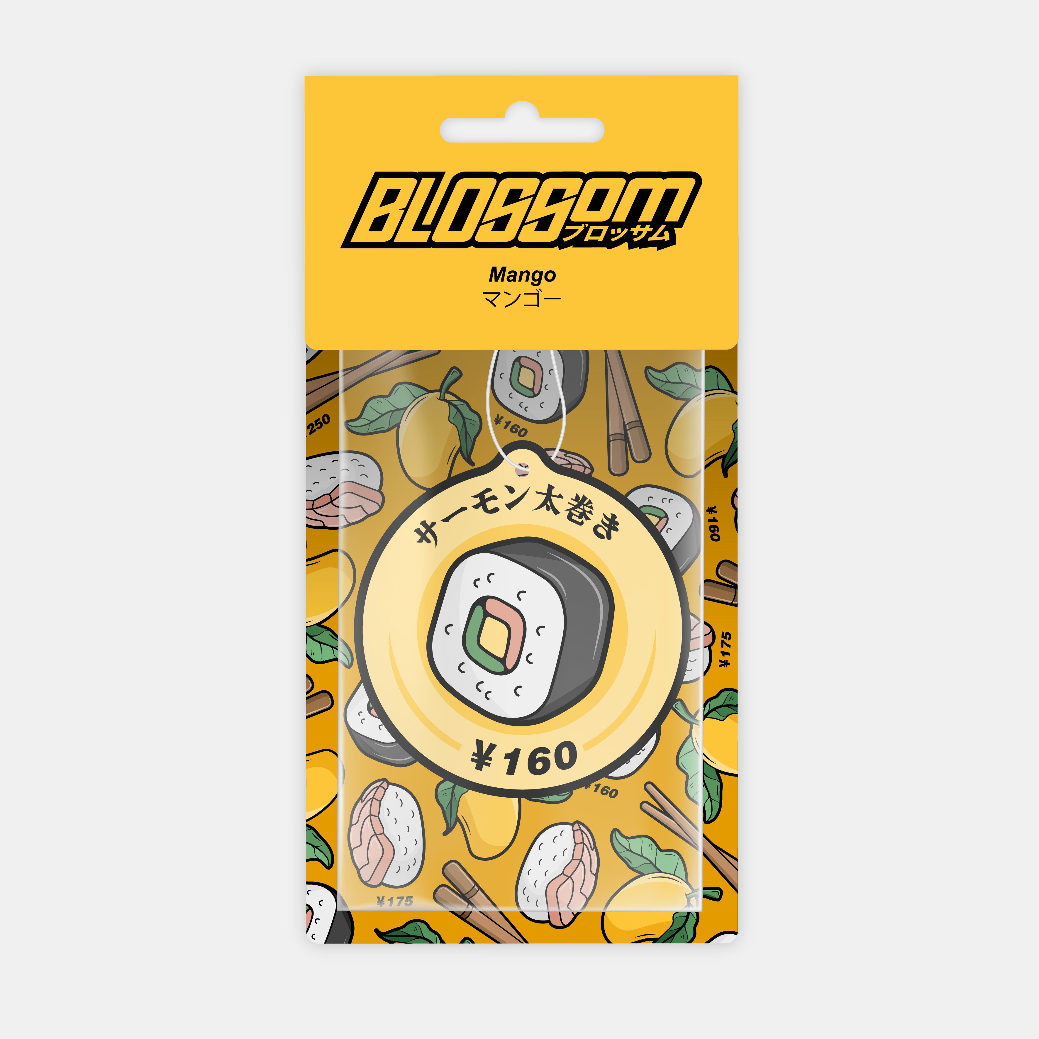 A vibrant package labeled "Blossom Automotive" displays sushi, mangoes, chopsticks, and Japanese text. The center features a round sushi graphic with "Mango," the product name "Tokyo Sushi" Air Freshener, and a ¥160 price.