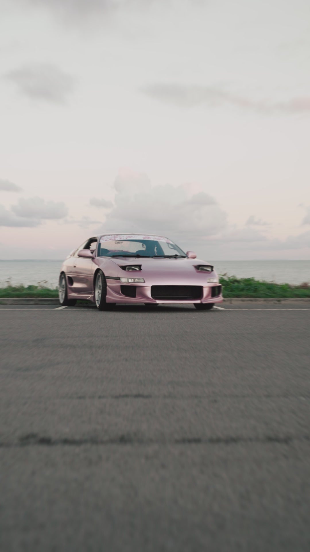 A video featuring the milkshake collection and a pink Toyota mr2.