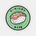 A Blossom Automotive "Nigiri Sushi - Slap Sticker" shows a cartoon-style salmon nigiri on a green plate. Japanese text above reads サーモンにぎり (salmon nigiri), with ¥175 below to indicate the price.