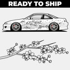 White car with black floral design and cherry blossom branch on a white background, 'Ready to Ship' text at the top.