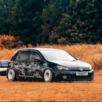 black car with Sakura livery