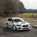 White Subaru car with Blossom Automotive zoku livery on it