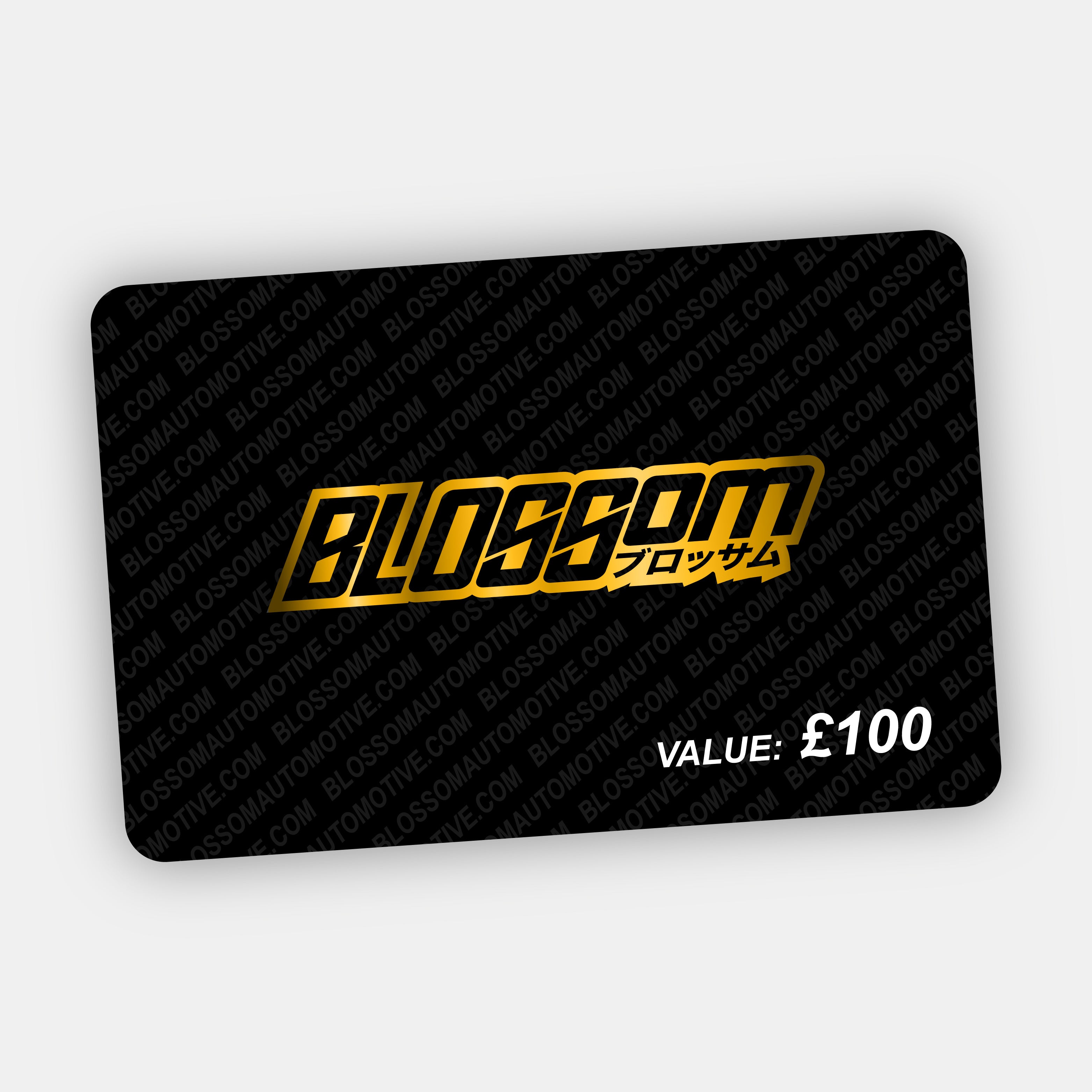 A black Blossom Automotive E-Gift Card features “BLOSSOM” and Japanese characters in gold, repeated in the background, with “VALUE: £100” in white at the bottom right.