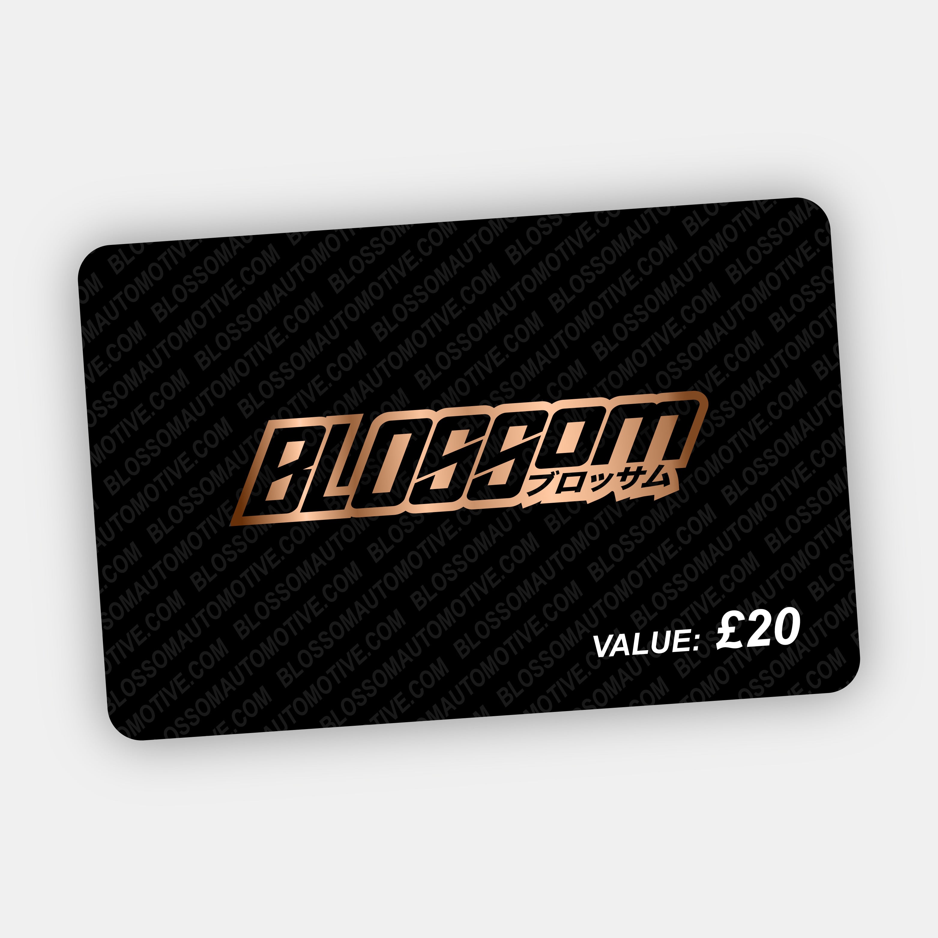 The Blossom Automotive E-Gift Card - £20 by Blossom Automotive features BLOSSOM in bold metallic letters with Japanese text below, VALUE: £20 in white on the bottom right, and a repeating BLOSSOMCAU pattern on a black background.