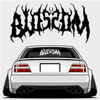 Illustration of a white sports car from the rear, featuring wide tires and cambered wheels. The Blossom Skate Logo - XL Rear Window Die-Cut Sticker by Blossom Automotive appears in a bold black font above and on the car's rear window.