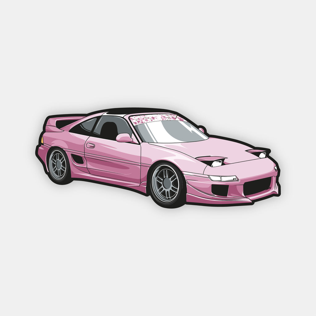 Blossom Automotive's MR2 - Slap Sticker features a pink sports car with pop-up headlights, tinted windows, low body kit, and large alloy wheels on a plain light gray background.