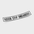The Blossom Automotive Never Stop Dreaming - Die Cut Sticker features bold black text on a white rectangular design, slightly curved, with the inspiring message "NEVER STOP DREAMING" on a plain white background.
