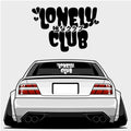 A white modified car with wide tires and a lowered stance displays the Blossom Automotive Lonely Club - XL Rear Window Die-Cut Sticker in bold letters and Japanese text on the rear windshield, also shown above the car on a gray background.